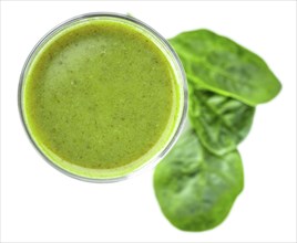 Homemade spinach smoothie isolated on white background (close up, selective focus)