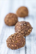 Wooden table with Falafels (close-up shot, selective focus)