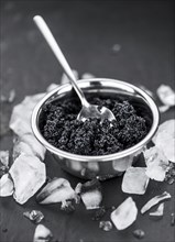 Caviar on a vintage looking slate slab (selective focus)