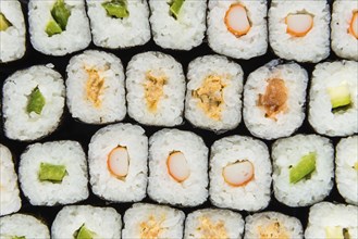 Fresh made Sushi (selective focus) on a vintage looking slate slab