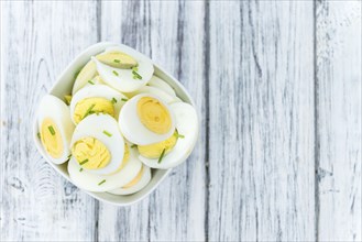 Portion of halved Eggs as detailed close-up shot (selective focus)