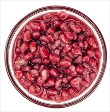 Preserved Pomegranate seeds as detailed close-up shot isolated on white background (selective