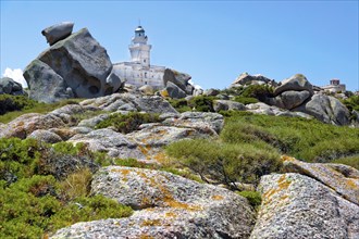 Europe Italy Island of Sardinia Capo Testa lighthouse with rocks