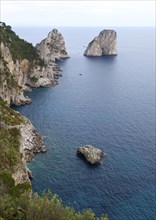 Faraglioni, famous giant rocks, Capri island in Italy