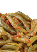 Cooked green bean with tomato sauce on white background