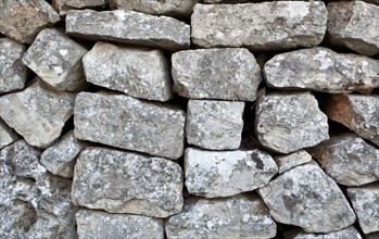 Close up of Stone wall of a Trullo in Alberobello