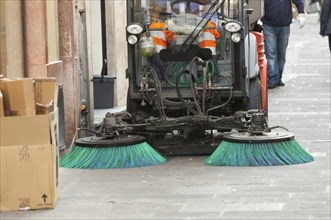 A street sweeper machine cleaning the streets