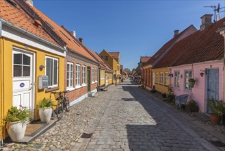 Old town of Rudkobing, renovated houses, colourful row of houses, dormers, decorative design,