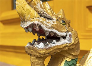 Close-up of gilded Naga, guardian deity, Wat Mixai, Vientiane, Laos, Asia