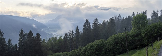 Evening clouds and fog over the Liesingtal, in the valley the village Traboch, Schoberpass federal