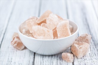 Portion of pink himalayan Salt (detailed close-up shot, selective focus)