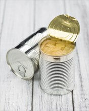 Preserved Pineapple pieces on a vintage background as detailed close-up shot, selective focus