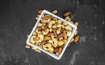 Portion of roasted nuts as detailed close up shot (selective focus)