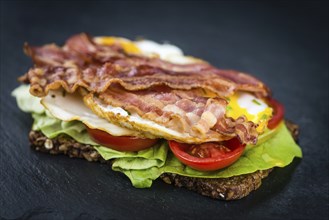 Portion of Bacon and Eggs (selective focus, close-up shot)