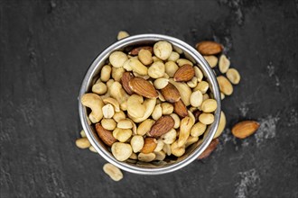 Portion of roasted nuts as detailed close up shot (selective focus)