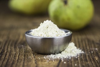 Portion of Pear powder as detailed close-up shot, selective focus