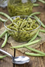 Portion of canned Green Beans (close-up shot, selective focus)