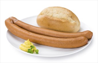 Portion of Wiener Sausages (as close-up shot) isolated on white background