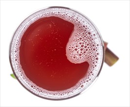 Fresh made Rhubarb Spritzer isolated on white background (close up, selective focus)