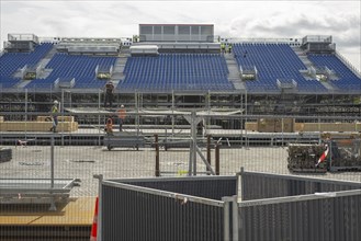 Scaffolders at work, erecting a large scaffold, grandstands for the Olympic Games, Place de la