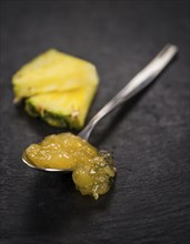 Some homemade Pineapple Jam as detailed close-up shot, selective focus