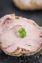 Fresh made Sandwich with Liverwurst on a vintage background (close-up shot)