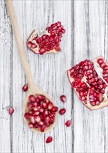 Portion of Pomegranate seeds (close-up shot, selective focus)