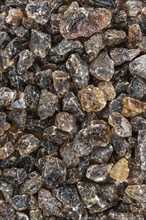 Portion of brown Rock Candy as detailed close-up shot (selective focus)