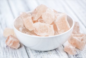 Portion of pink himalayan Salt (detailed close-up shot, selective focus)