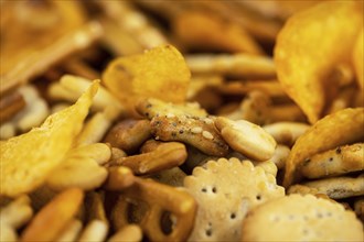 Portion of mixed Snacks (detailed close up shot, selective focus)