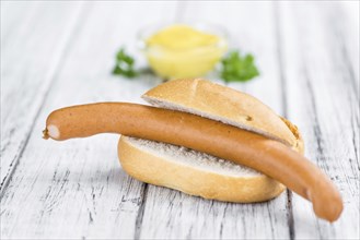 Fresh made German Sausages (Wiener) on a vintage background (close-up shot)