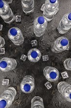 Bottles of chilled sparkling water as detailed close up shot