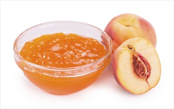 Portion of Peach Jam on a rustic slate slab, selective focus, close-up shot