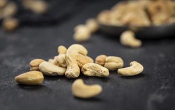 Portion of Cashew Nuts (close up shot, selective focus)