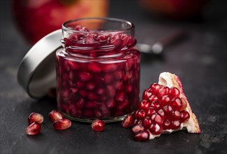 Some fresh preserved Pomegranate seeds (selective focus, close-up shot)