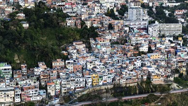 Favela Vidigal in Rio de Janeiro during sunset, aerial shot from a helicotper