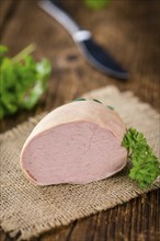 Portion of fresh made Liverwurst (close-up shot, selective focus)