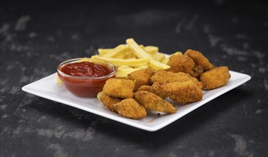 Chicken Nuggets as detailed close-up shot (selective focus)