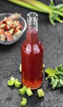 Homemade Rhubarb Spritzer as detailed close up shot (selective focus)