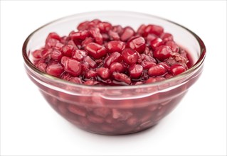 Some preserved Pomegranate seeds isolated on white (selective focus)