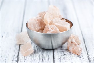 Portion of pink himalayan Salt (detailed close-up shot, selective focus)