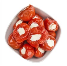 Fresh made Red Pepper (stuffed with cheese) isolated on white background (close-up shot)