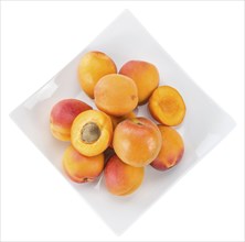 Apricots isolated on white background (selective focus, close-up shot)