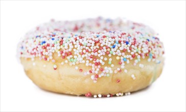 Some fresh made Donuts isolated on white background (close-up shot)