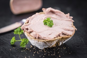 Liverwurst Sandwich on a vintage background as detailed close-up shot (selective focus)