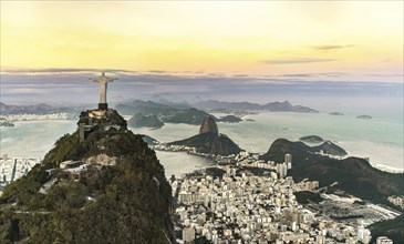 Cristo Redentor statue in Rio de Janeiro (aerial shot made from a helicopter) during a spectacular