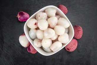 Portion of fresh Lychees (close-up shot, selective focus)