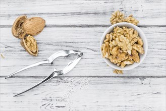 Portion of fresh Walnut kernels (close-up shot, selective focus)