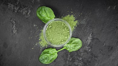 Freshly made green spinach powder (detailed close up shot, selective focus)