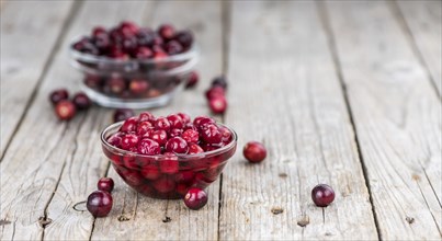 Portion of healthy Cranberries (preserved) (selective focus, close-up shot)